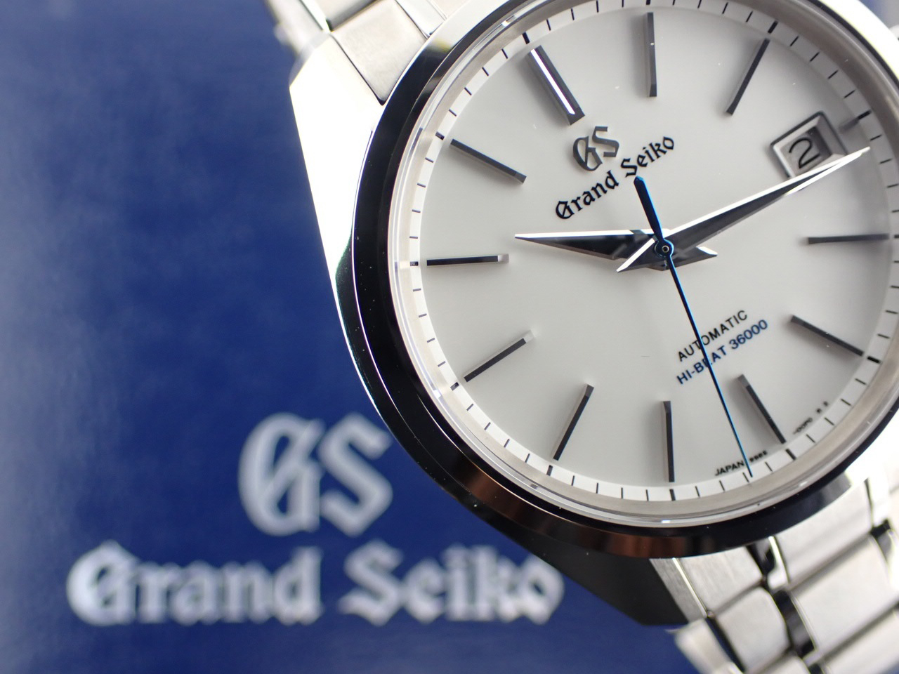 グランドセイコー 9Sメカニカルハイビート ブライトチタン ホワイト文字盤 SBGH243(9S85-00W0)  を最安値価格で販売中！－ブランド時計販売のクエリ